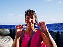 Melissa Ryan holds up compressed styrofoam cups