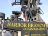 Submersible pilot Hugo Marrero checks the positioning of the LOLAR on top of the JSL.