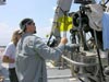 Dr. Mikhail Matz checking his yellow submersible light filters prior to launch.