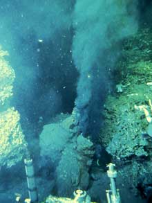 The first photograph of a black smoker vent published on the cover of Science magazine.