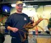 Chief scientist Andrew DeVogelaere holds a black-coral specimen.