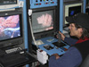 Coral colonies come into view on the pilot's monitors.