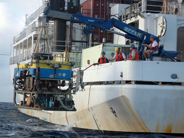 During launch operations, the Jason team gently lowers the ROV into the Gulf of Mexico.