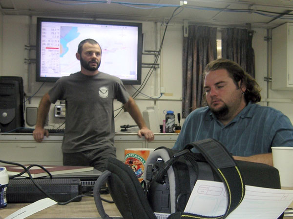 Dr. Erik Cordes, Chief Scientist for the expedition giving the evening science brief before the evening launch. 