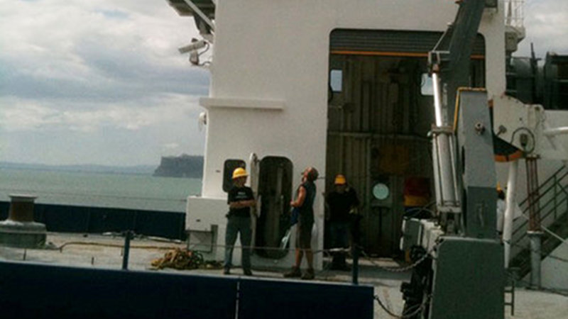 The deck of the research vessel (R/V) Melville was empty for only a few minutes before it was loaded up for the next cruise, with every inch of the deck covered with gear.