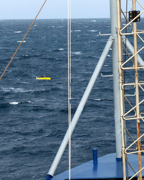 Sentry looks truly tiny when it first comes to the surface just ahead of the bow of the ship, 300 meters distant among white-capped wave-tops.