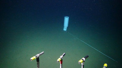 Biofilm recruitment experiments, like the one pictured here, will include wood samples to study how microorganisms are ‘island hopping’ across built wood structures on the seafloor.