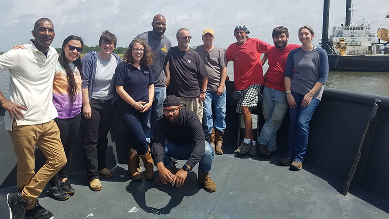 The crew, from left: Kelvin, Alex, Louise, Megan, Gilbert, Darren, Scott, David, Corey, and Amanda; in front, James.