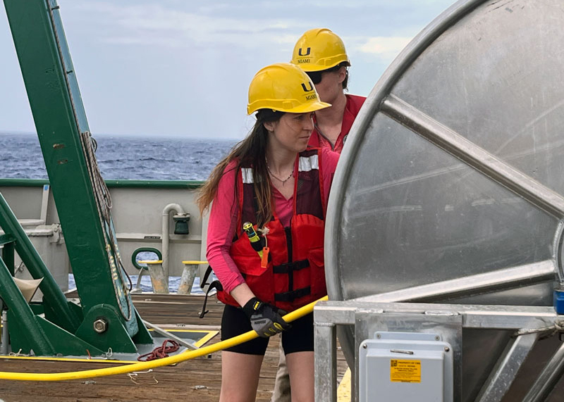 Courtney Brooks and Madison Lytle handle the umbilical tether for the remotely operated vehicle.