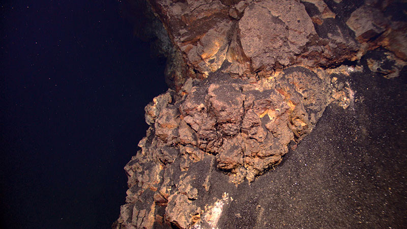 The slope explored during today’s dive on Kawio Barat was covered by dark volcaniclastic sediments – fine bits of pulverized rock produced by explosive lava eruption higher up the slope.