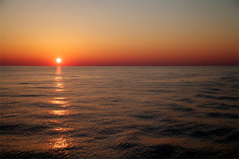 Mission personnel spent much of the day catching up on work and in the evening, time on deck enjoying the sunset.