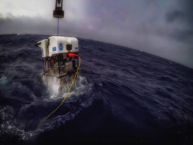 Today's dive was cancelled due to increasingly heavy winds and seas. Here, ROV Deep Discoverer is recovered and safely brought back on deck.