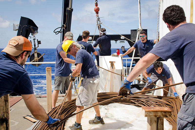 A short between the conductors in the .68 cable, located 2,850 meters (9,350 feet) up the cable, caused a power loss to the vehicles yesterday. The damage could not be repaired so the remotely operated vehicle team used the day to plan and spool the cable off the storage drum, manually lay roughly 2,900 meters (9,514 feet) of cable onto the deck and cut out the damaged section. The remaining cable was found to be in acceptable condition and will be re-terminated to continue operations.