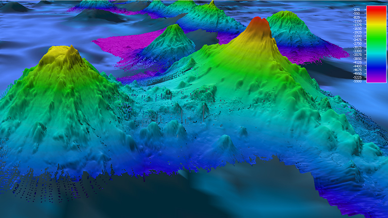 3D topographic map of undersea mountains with a color gradient scale.